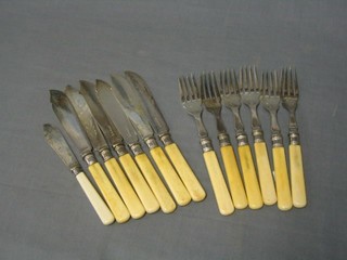 A set of 6 silver plated fish knives and forks and a silver bladed butter knife