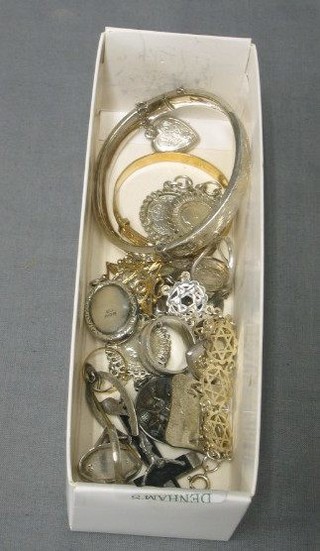 An engraved silver bangle and a collection of costume jewellery