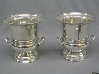 A pair of silver plated twin handled wine coolers or urn form 9"