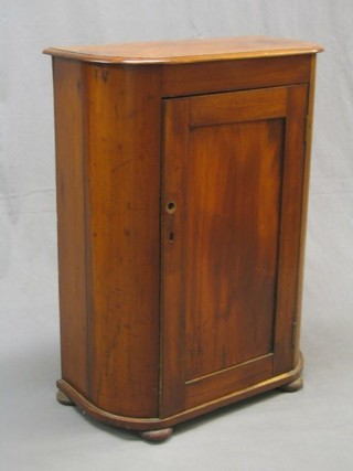 A Victorian D shaped mahogany cabinet enclosed by a panelled door 26"