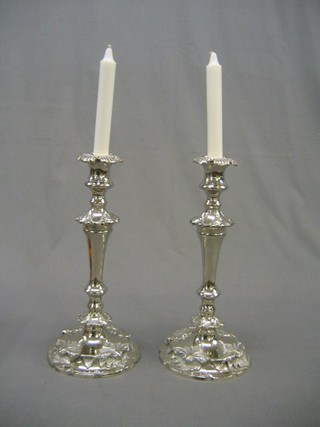 A large and impressive pair of silver plated Rococo style candlesticks 14"