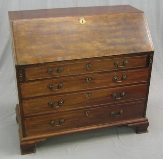 A Georgian mahogany bureau, the fall front revealing a well fitted interior above 4 drawers with brass swan neck drop handles, raised on ogee bracket feet 42"