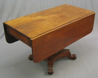 A handsome Georgian mahogany pedestal Pembroke table fitted 2 frieze drawers, raised on a swirl carved column with triform base and scrolled feet 46"