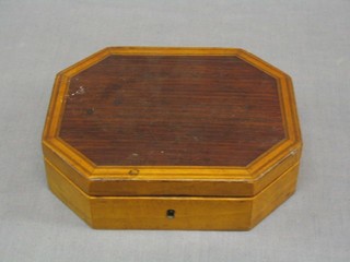A 19th Century lozenge shaped mahogany box with hinged lid 7"