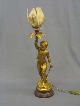 Ernest Justin Ferrand (1846-1932),  a gilt bronze table lamp in the form of a young girl with bull rush, holding a lamp aloft, signed, 21"