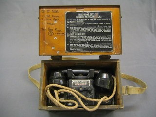 An old field telephone, cased