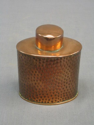 An Art Nouveau oval planished copper tea caddy, the base marked JSS 4"