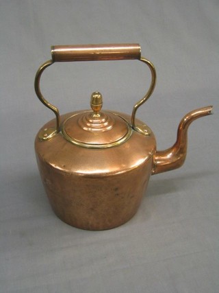 A Victorian copper kettle with acorn finial