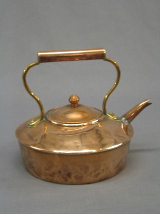 A 19th Century circular flat bottomed kettle
