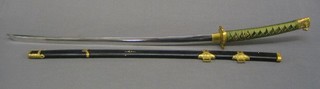 A reproduction Katana with plain blade and having green cord work to the grip 43"