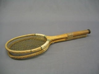 An Austin tennis racquet marked Austin 55 High St London and a Talmo Model 1 tennis racquet (some damage to strings)