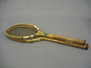 An Elite tennis racquet by W H Lee and 1 other