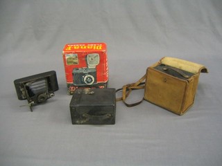 A Diana F Flash camera together with 2 box cameras and a folding camera