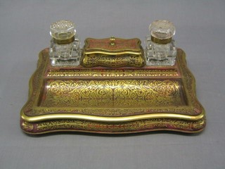A fine quality 19th Century red Buhl standish of serpentine outline, fitted a stamp box to the lid and with 2 cut glass inkwells and pen recess, 16"