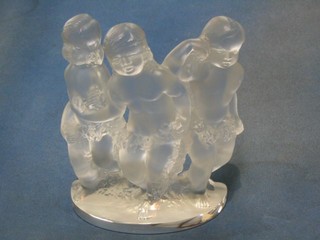 A 20th Century Lalique glass figure group of 3 standing cherubs with garland 8", signed Lalique France