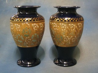 A pair of Royal Doulton, Doulton & Slater pattern blue and gilt salt glazed vases, bases marked Royal Doulton and impressed 711, 11" (1 with firing marks)