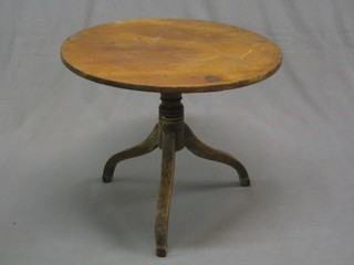 A 19th Century circular snap top wine table, raised on a turned column 24" (some damage)