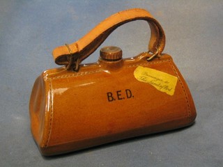 A Denby hotwater bottle in the form of a handbag, base marked Bourne Denby England RD no. 740416 8"
