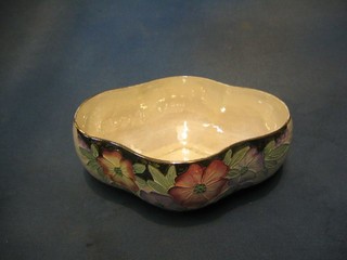 A Malingware shaped bowl with floral decoration 9"