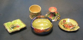 A Malingware circular pottery bowl with handle 4 1/2", a circular preserve jar 3", a square ashtray (chip to base), a scallop shaped Rosalin pattern bowl and a circular candlestick base marked 615YE 4"