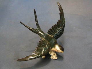 A 20th Century Continental porcelain figure of a diving bird 6", base marked ENS