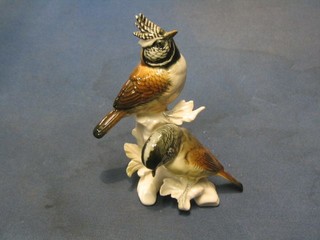 A 20th Century Continental porcelain figure group of 2 seated birds, base marked ENS 6"
