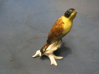 A 20th Century Continental porcelain figure of yellow bird on branch 7", base marked ENS