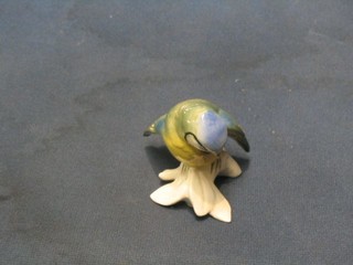 A 20th Century Continental porcelain figure of a seated Blue Tit, 3", base marked ENS