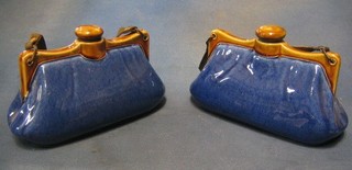 A pair of Bourne Denby hotwater bottles in the form of handbags, the base marked RD no. 748183