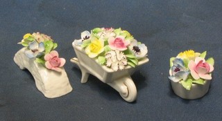 A Royal Doulton floral posy in the form of a wheel barrow 4" and other small posies