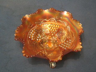 An orange Carnival glass bowl decorated grapes 8"