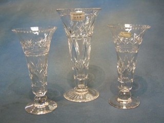 A Stuart cut glass trumpet shaped vase and a pair of Stuart cut glass trumpet shaped vases 10" and 7 1/2"