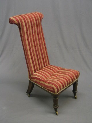A Victorian mahogany framed Pri Dieu chair upholstered red and white striped material