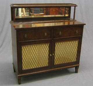 A 19th/20th Century mahogany chiffonier with raised mirrored back, the base fitted 2 drawers above a double cupboard enclosed by grilled panelled doors, raised on splayed feet, 44"