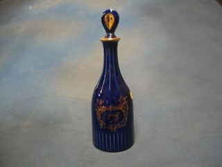 A Wade pottery blue glazed port decanter and stopper