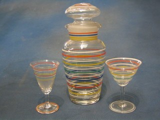 A 1930's 13 piece coloured glass cocktail set with cocktail shaker and 12 glasses