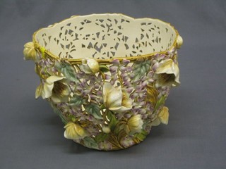 A Hungarian pierced porcelain jardiniere with floral encrusted decoration