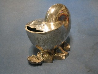 A Victorian engraved silver plated shell shaped spoon warmer