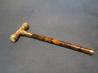 A fine quality 18ct pierced gold and "moon stone" parasol handle with turned bamboo shaft