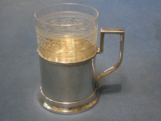 A Russian silver cup holder with bead work border, monogrammed, 2 ozs, together with an etched glass