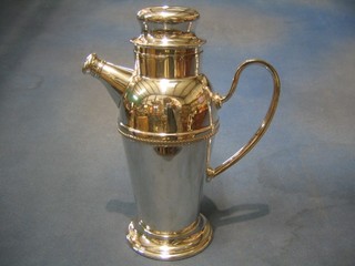 An Art Deco silver plated cocktail shaker
