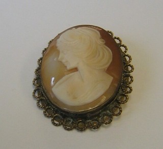 A shell carved cameo portrait brooch in a gilt mount