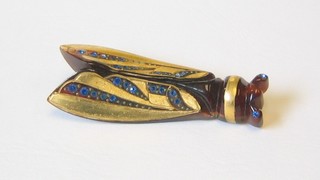 A "tortoiseshell" scarab brooch