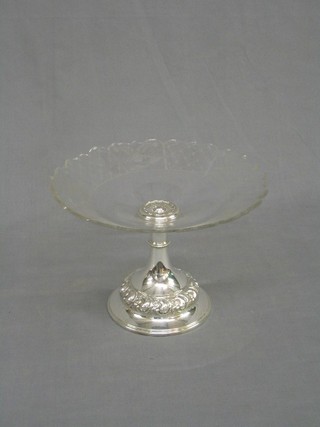 A circular etched glass tazza raised on an embossed silver plated base