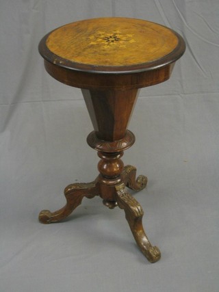 A Victorian walnut work box of conical form with hinged lid, inlaid throughout and raised on a tripod base 19"