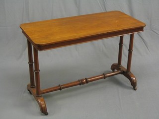 A Victorian walnutwood stretcher table, raised on 4 turned supports united by an H framed stretcher 44"