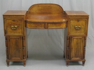 A handsome William IV mahogany pedestal sideboard with raised back fitted 2 short drawers flanked by pedestals fitted 2 short drawers above a cupboard 60"