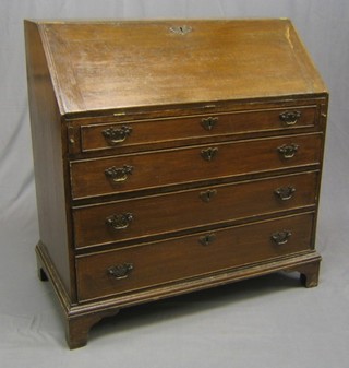 A Georgian Country oak bureau, the fall front revealing a stepped interior with well, above 4 long graduated drawers with brass swan neck drop handles, raised on bracket feet 36"