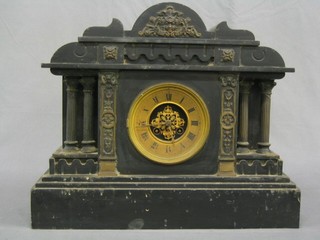 A Victorian French 8 day striking mantel clock with gilt dial and Roman numerals contained in a black marble architectural case
