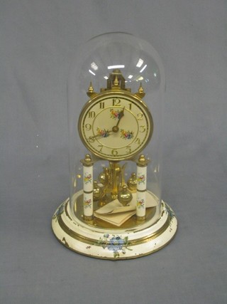 A 1950's German 400 day clock with gilt dial and floral decoration complete with dome